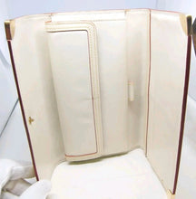 Load image into Gallery viewer, LOUIS VUITTON IVORY SUHALI PORTE-TRÉSOR INTERNATIONAL LEATHER WALLET
